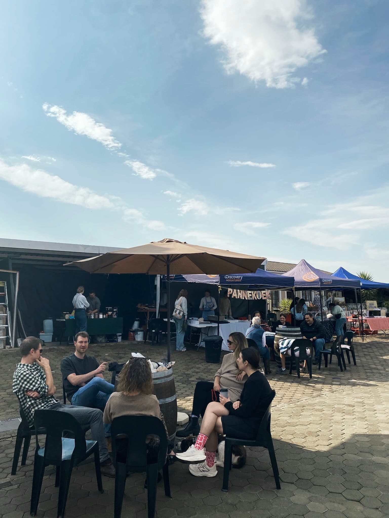 Visitors relaxing between the stalls at Mount Noah